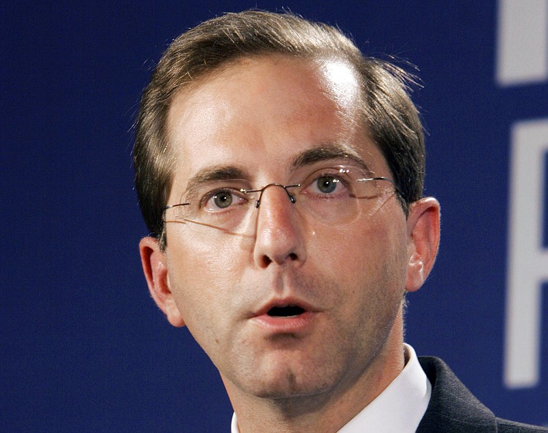 In this May 1, 2006 file photo, former Deputy U.S. Health and Human Services Secretary Alex Azar, speaks at a meeting in Jackson, Miss. President Donald Trump's pick for health secretary is a former drug company executive who's already taking heat from Democrats over pricing and conflicts. But as Azar faces his first nomination hearing, even some of those say they see flickers of evidence that he can be trusted to shift the health care debate from partisan confrontation. (AP Photo/Rogelio Solis)