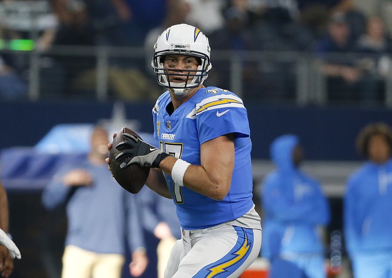 
              In this Nov. 23, 2017, photo, Los Angeles Chargers quarterback Philip Rivers (17) prepares to throws a pass during an NFL football game against the Dallas Cowboys in Arlington, Texas. Rivers will have the NFL's longest active streak of consecutive starts by a quarterback after Eli Manning gets benched by the New York Giants this weekend. (AP Photo/Roger Steinman)
            