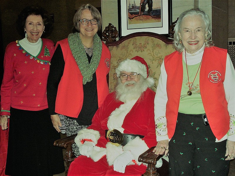 Lounelle Draper, Jamie Curtis, Santa Claus (Richard Bonnington) and Barbara Kelley. (Contributed Photo)