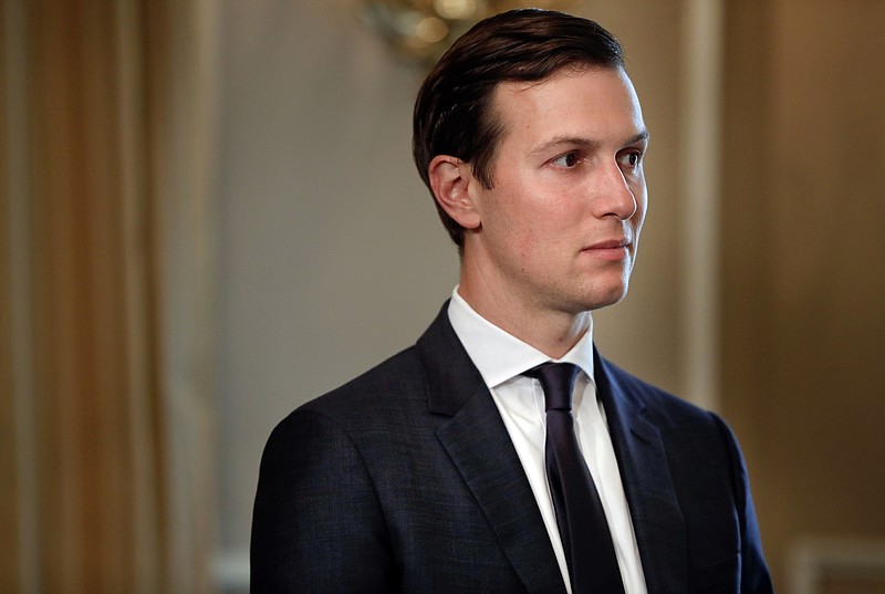 In this Friday, Aug. 11, 2017, file photo, White House senior adviser Jared Kushner listens as President Donald Trump answers questions at a news conference, in Bedminster, N.J. Kushner has been questioned by special counsel Robert Mueller's team of investigators about former national security adviser Michael Flynn. That's according to a person familiar with the investigation who spoke to The Associated Press on Nov. 29, on condition of anonymity. (AP Photo/Pablo Martinez Monsivais, File)