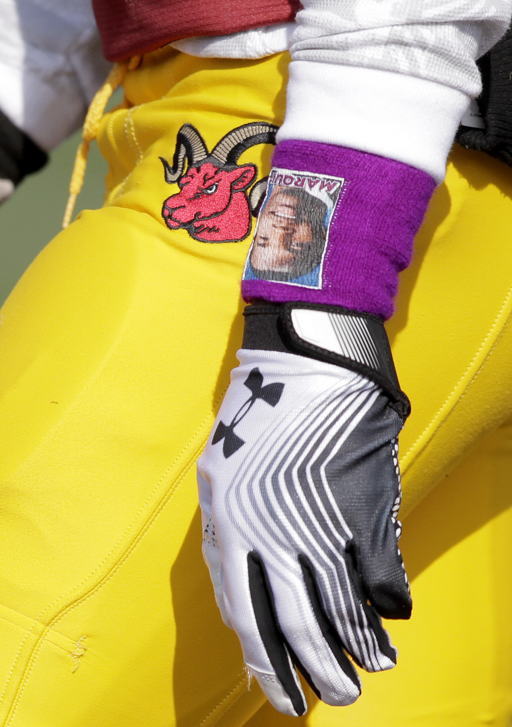 Tyner's KeՕn Webb wears a wristband honoring former all-state Tyner quarterback Marquice