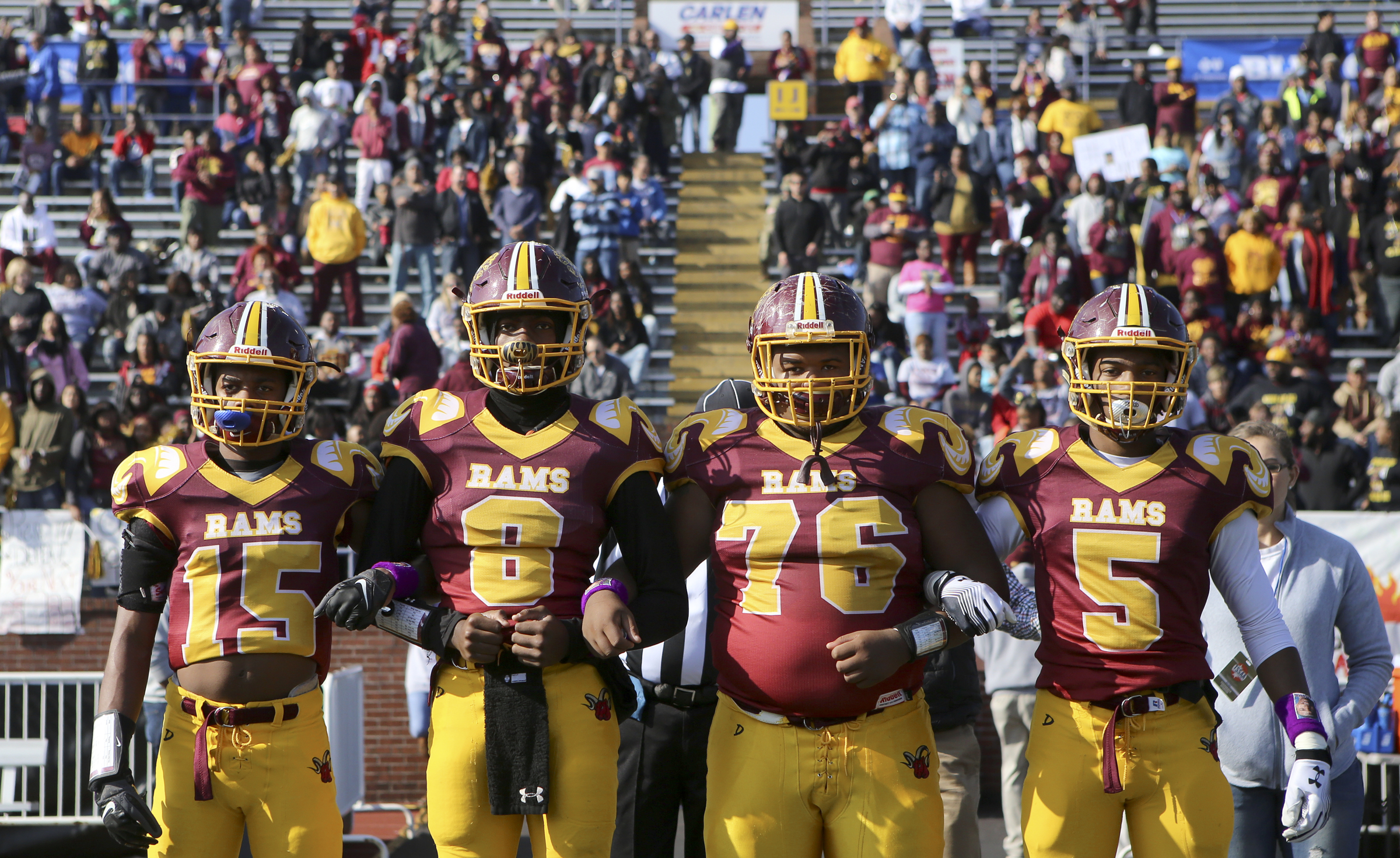 Tyner captains RahՌe High (15), Jaylen Bowens (8), Tracey Justice (76) and KeՕn Webb (5) prepare to walk to midfield for the coin toss for the Class 2A BlueCross Bowl state championship against Union City at Tennessee Technological University's Tucker Stadium on Friday, Dec. 1, 2017 in Cookeville, Tenn.