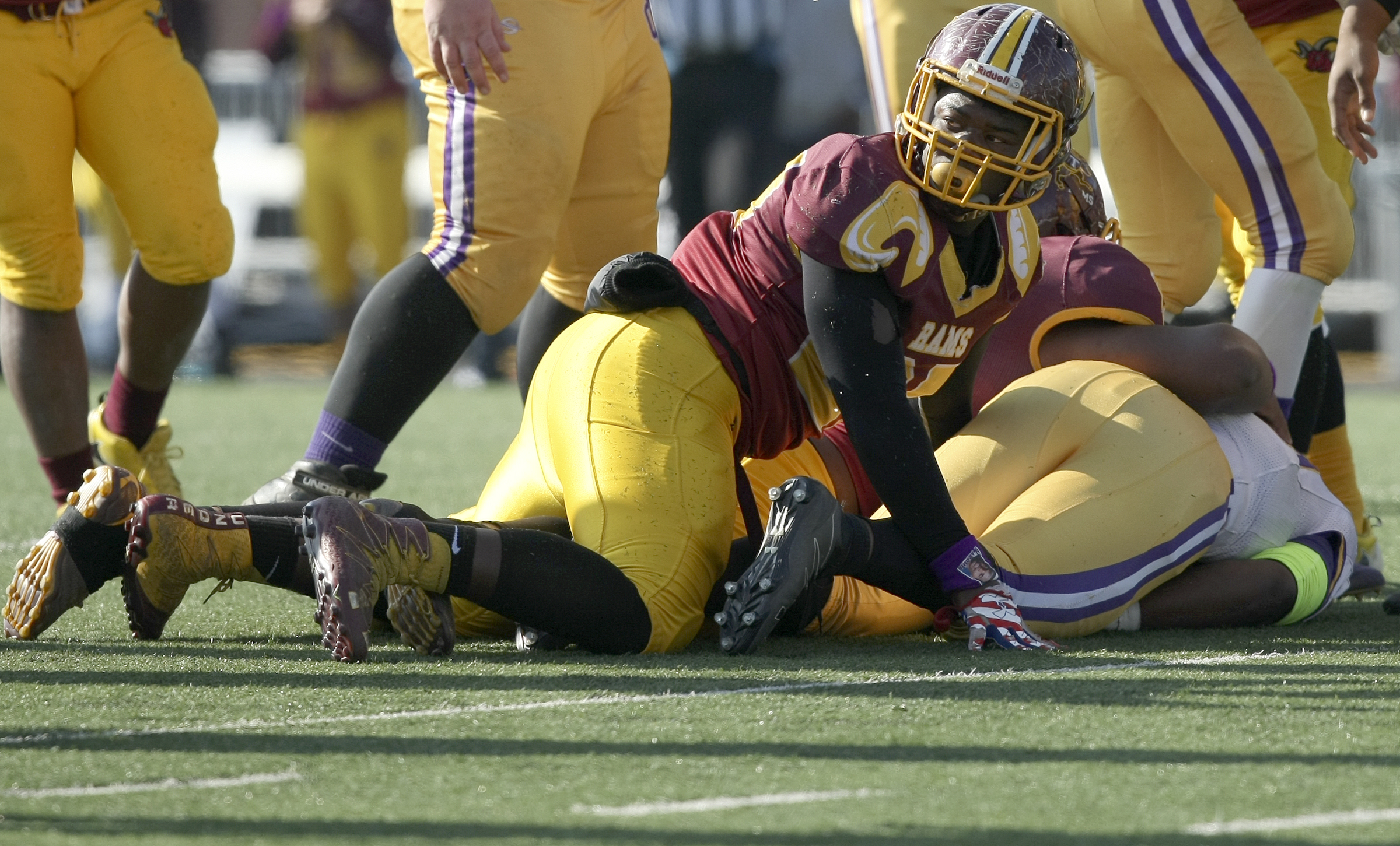 Tyner's Tyon Young (27) looks towards the sideline after stopping Union City's Trey Jones (30) on fourth down during the Class 2A BlueCross Bowl state championship at Tennessee Technological University's Tucker Stadium on Friday, Dec. 1, 2017 in Cookeville, Tenn. Union City would gain a first down on the play.