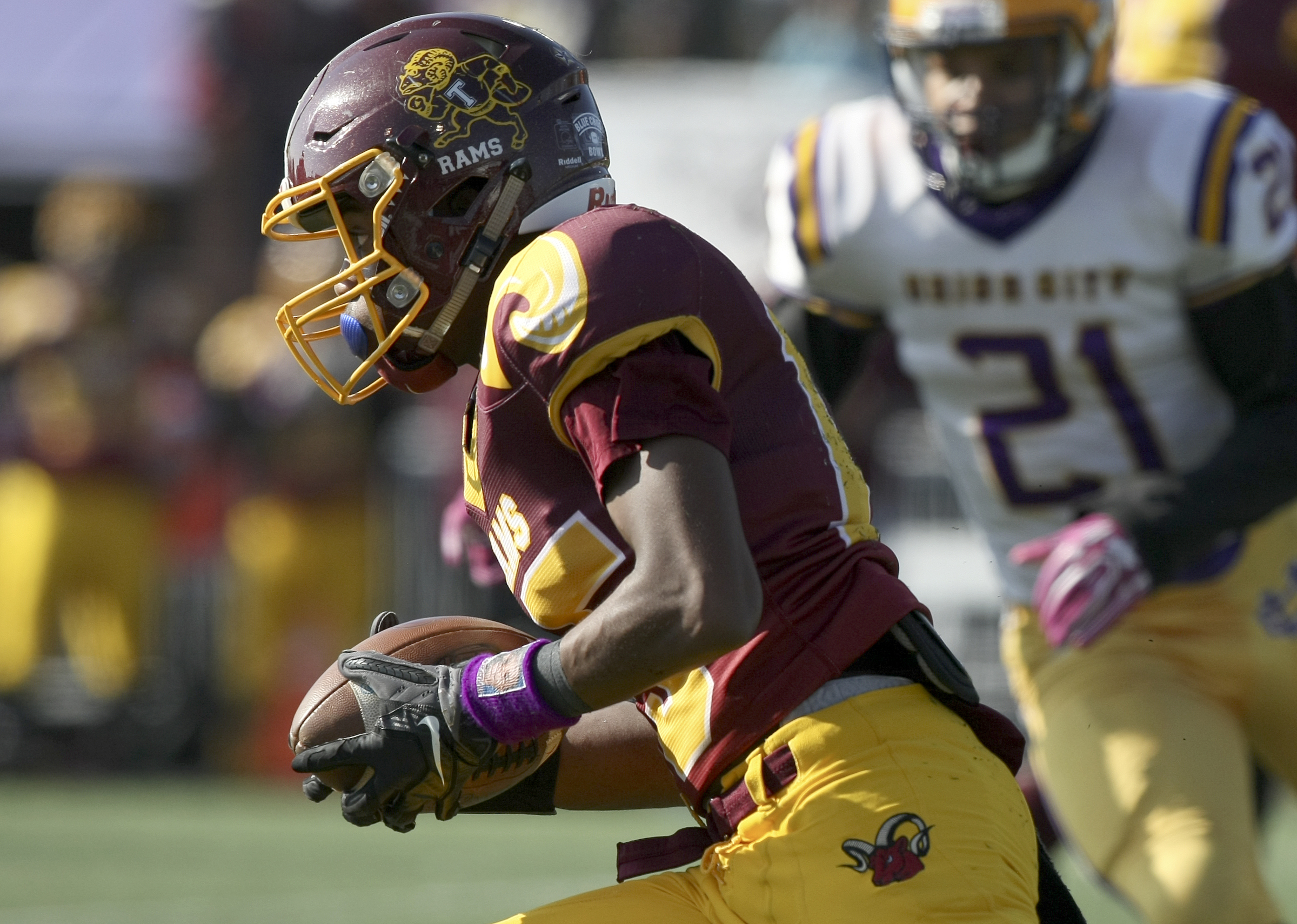 Tyner's RahՌe High (15) carries the ball against Union City during the Class 2A BlueCross Bowl state championship at Tennessee Technological University's Tucker Stadium on Friday, Dec. 1, 2017 in Cookeville, Tenn.