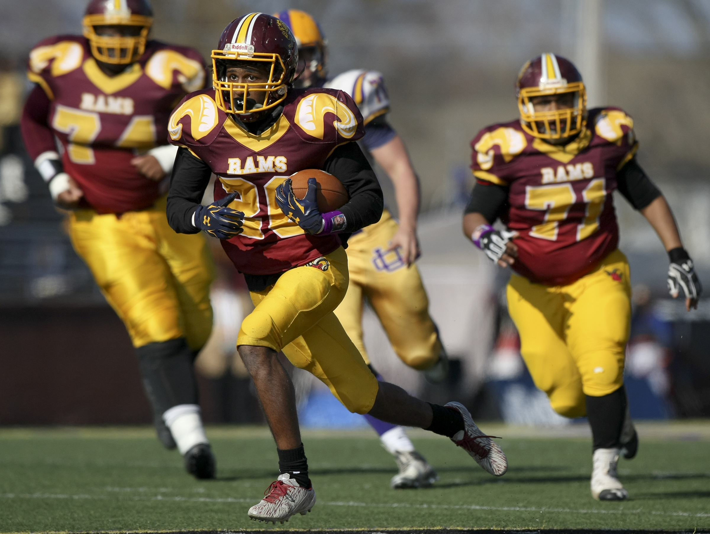 Tyner's Jeremy Elston (20) rushes for a 33-yard touchdown against Union City during the Class 2A BlueCross Bowl state championship at Tennessee Technological University's Tucker Stadium on Friday, Dec. 1, 2017 in Cookeville, Tenn.