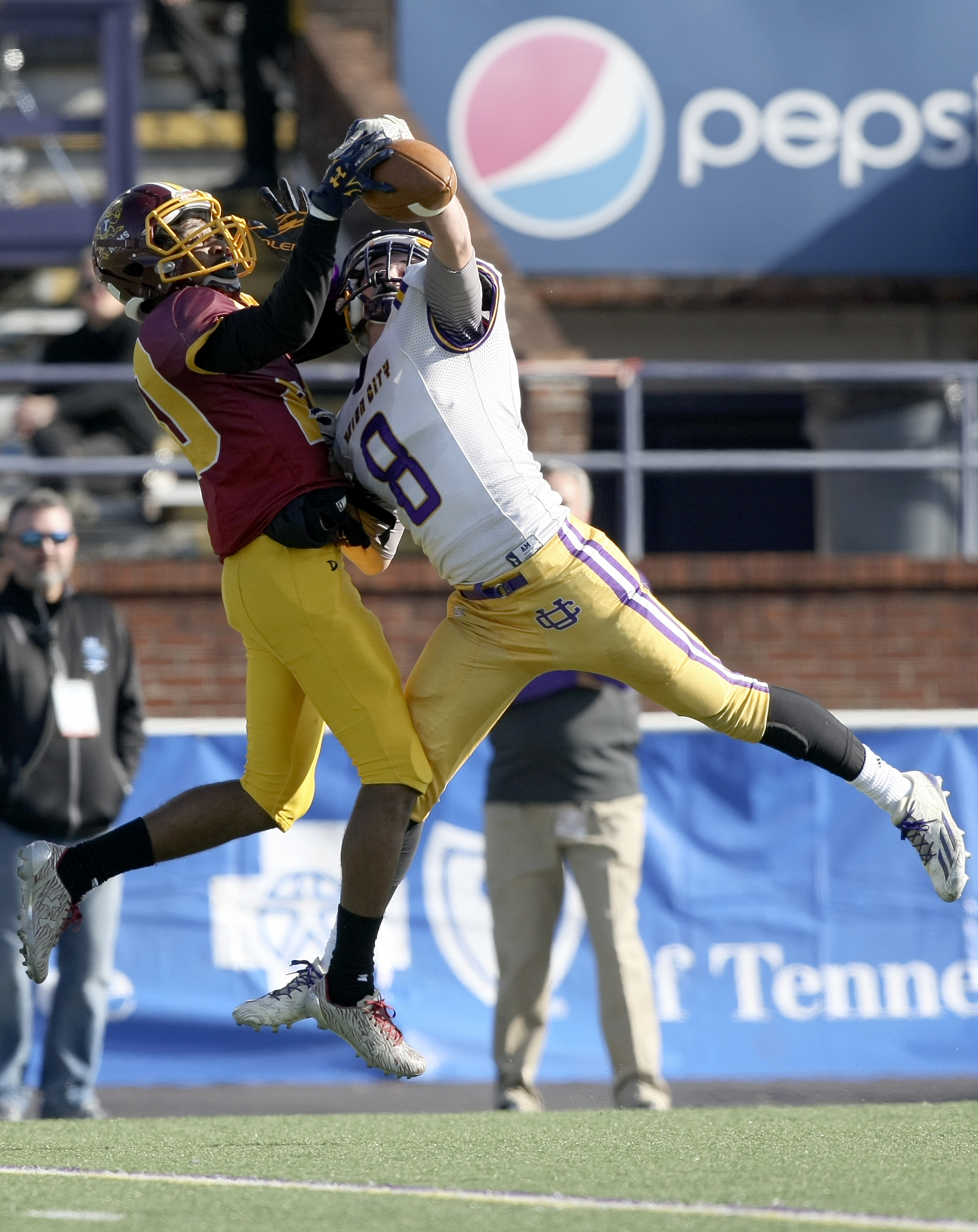 Union City's Grant Kizer (8) breaks up a pass intended for Tyner's Jeremy Elston (20) during the Class 2A BlueCross Bowl state championship at Tennessee Technological University's Tucker Stadium on Friday, Dec. 1, 2017 in Cookeville, Tenn. Kizer was called for pass interference on the play.