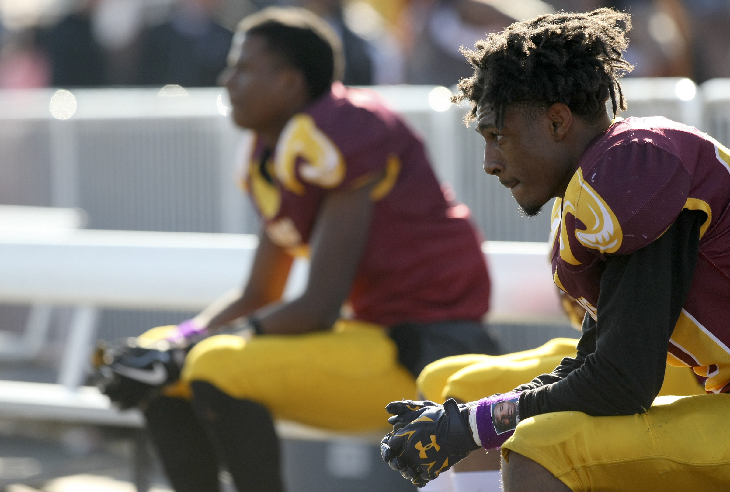 Tyner's Jeremy Elston, right, looks on from the bench as time winds down during the Class 2A BlueCross Bowl state championship with Tyner trailing Union City 14-6 at Tennessee Technological University's Tucker Stadium on Friday, Dec. 1, 2017 in Cookeville, Tenn.