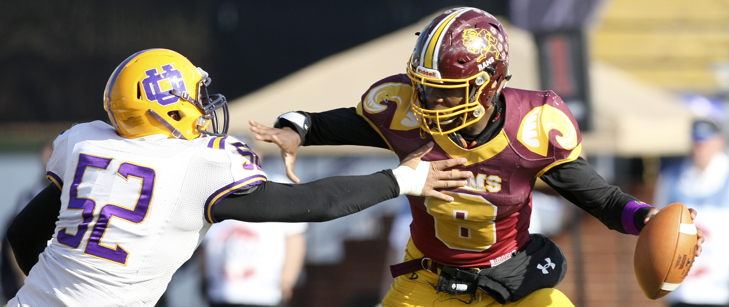Tyner's Jaylen Bowens (8) escapes from Union City's Kaleb Perkins (52) on a 2-point conversion during the Class 2A BlueCross Bowl state championship at Tennessee Technological University's Tucker Stadium on Friday, Dec. 1, 2017 in Cookeville, Tenn.