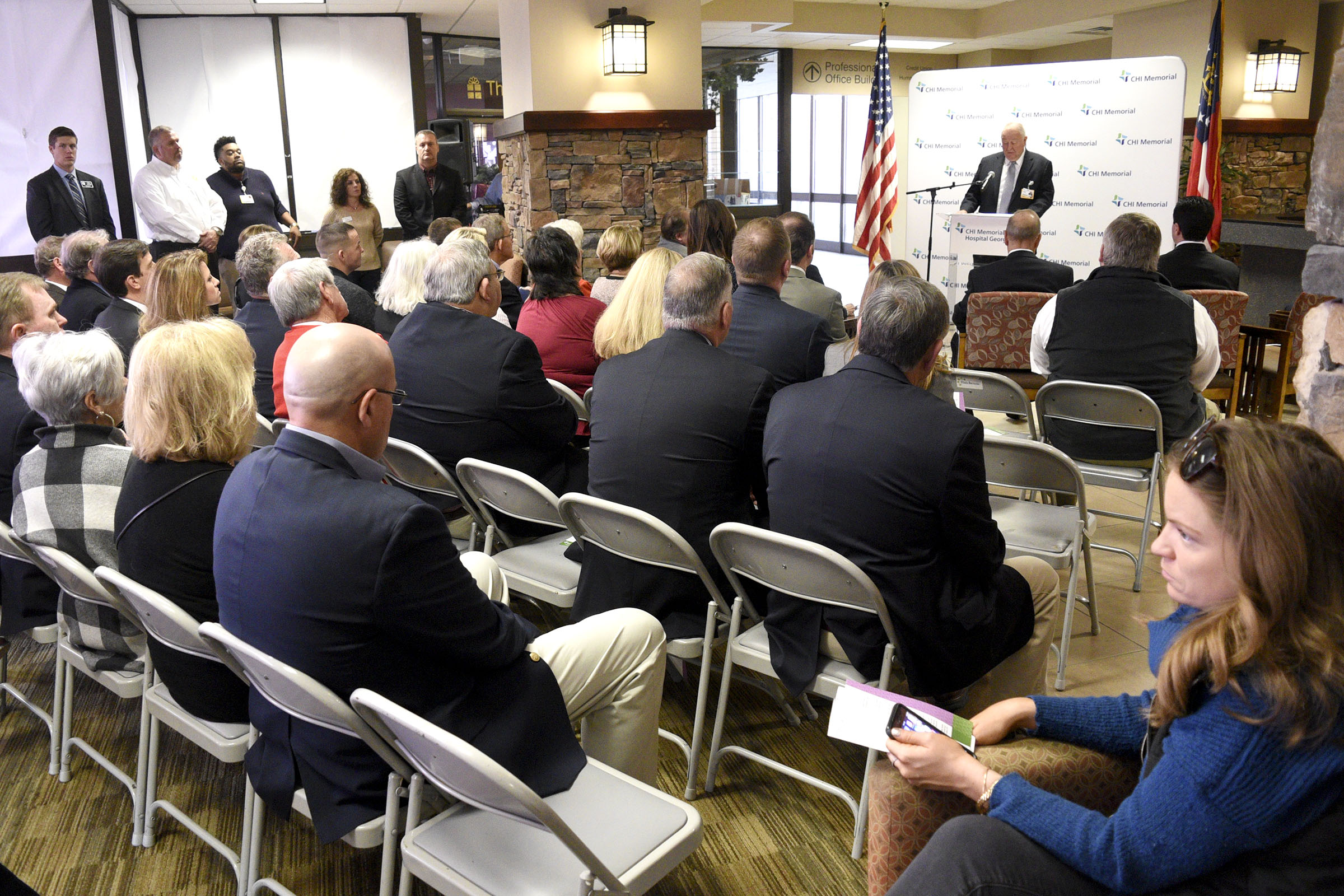 Larry P. Schumacher, RN, FAAN Chief Esecutive Officer, CHI Memorial and Senior VP of Operations, Southeast Division, CHI, announces the purchase of Cornerstone Medical Center in front of people gathered in the hospital's lobby. CHI Memorial Hospital will purchase Cornerstone Medical Center in late December, CEO Larry Schumacher announced December 1, 2017. In addition, CHI Memorial will purchase the former Hutcheson Medical Center ambulatory surgery center, located on Battlefield Parkway in Ringgold. The center has been owned by Regions Bank since Hutcheson shut down. on December 1, 2017.