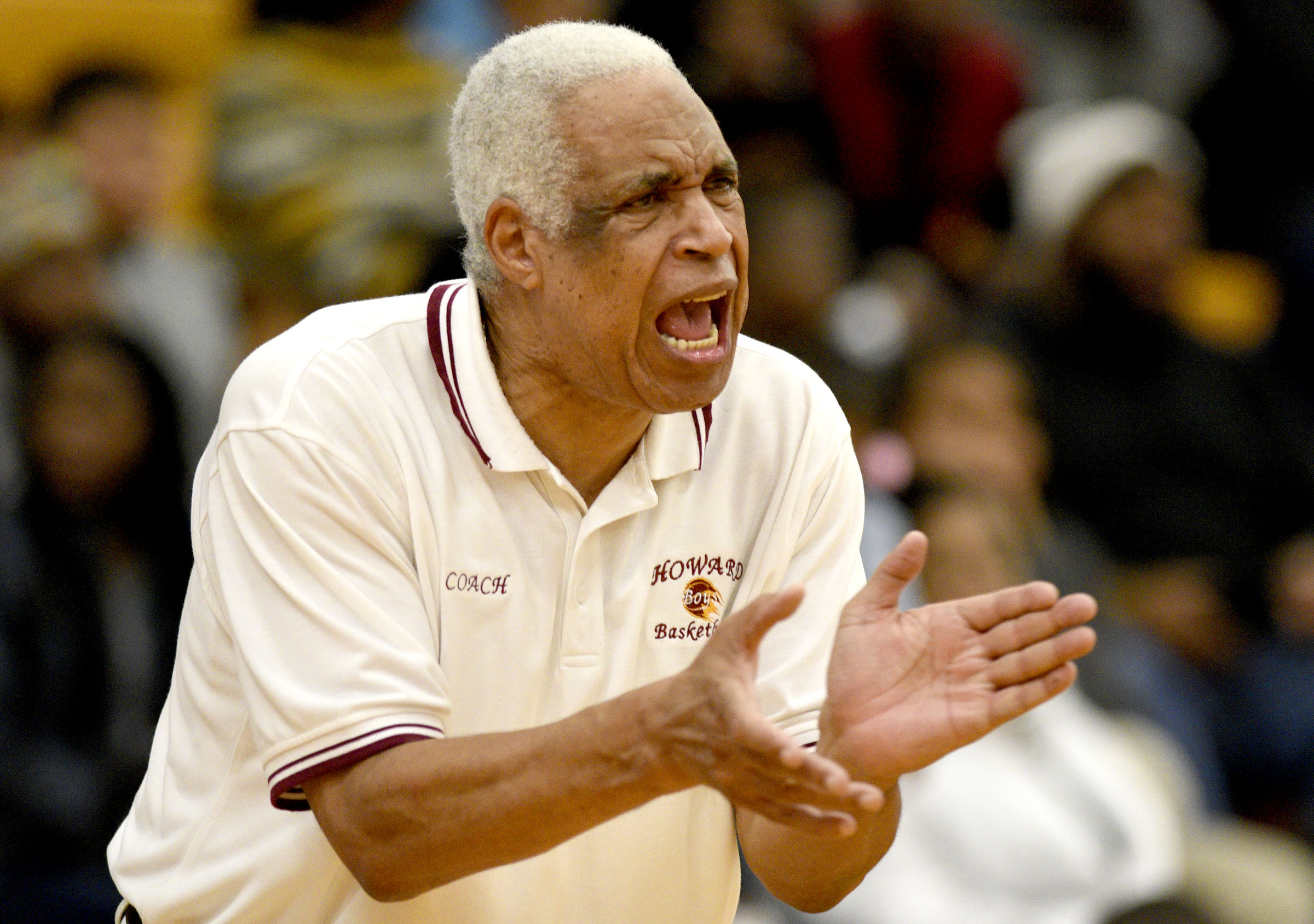 Howard coach Walter McGary encourages his Tigers. The Brainerd Panthers visited the Howard Hustling Tigers in TSSAA basketball action on December 1, 2017.