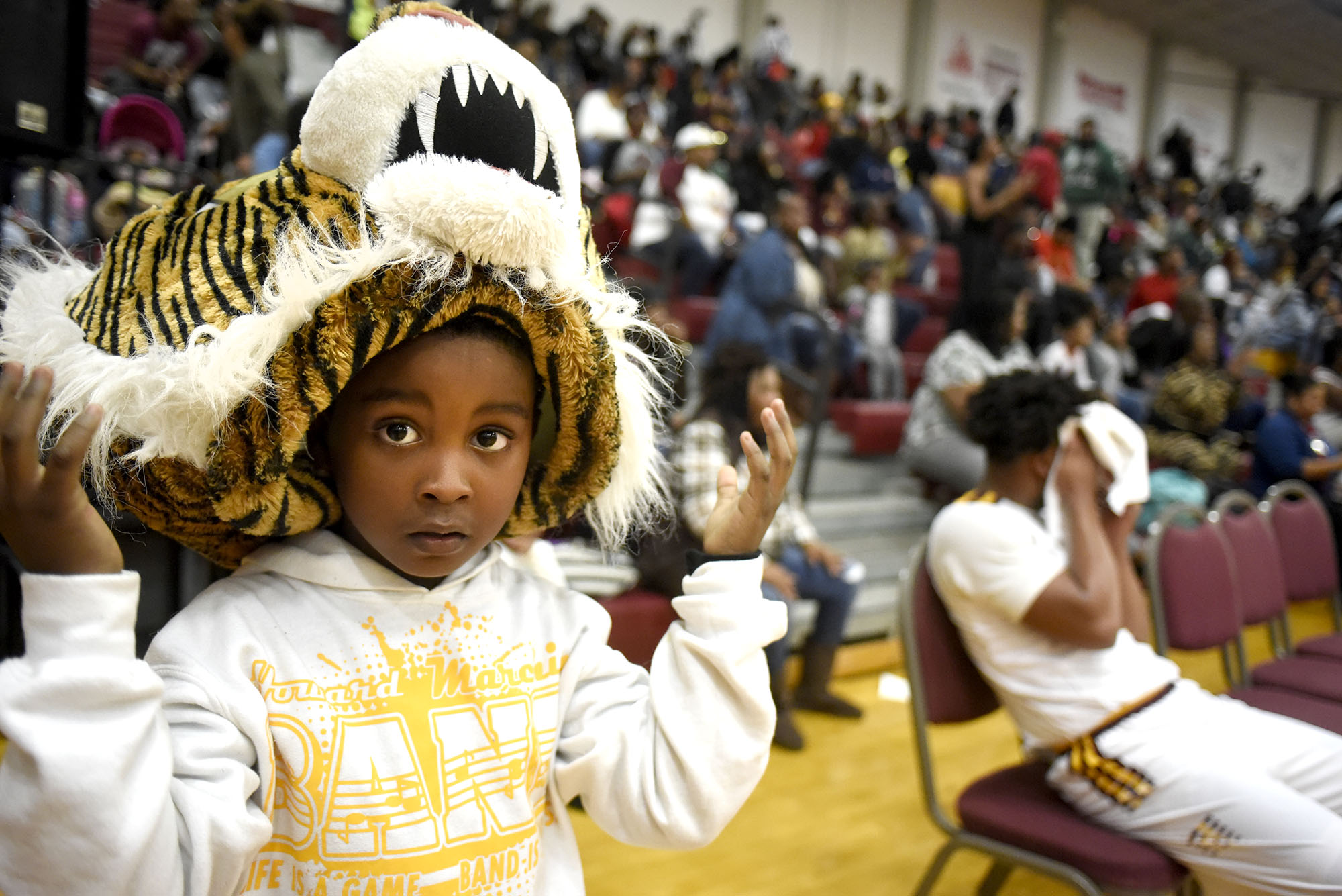 The Tiger takes a peek from under his mask. The Brainerd Panthers visited the Howard Hustling Tigers in TSSAA basketball action on December 1, 2017.