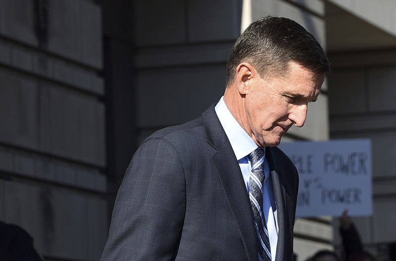 Former Trump national security adviser Michael Flynn leaves federal court in Washington, Friday, Dec. 1, 2017. 