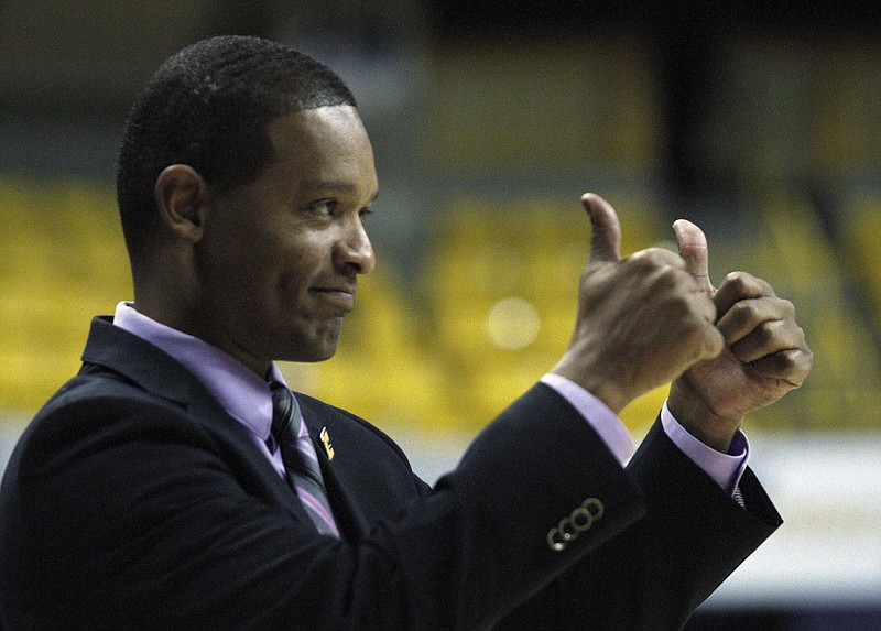 Photo by Bryant Hawkins / University of Tennessee Chattanooga's head coach Lamont Paris cheers on his team Saturday. The Chattanooga Mocs took on the UT Martin Skyhawks at McKenzie Arena in Chattanooga, Tenn. on Saturday Dec. 2, 2017.