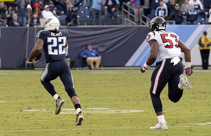 Tennessee Titans running back Derrick Henry (22) leaves Houston Texans outside linebacker Gimel President (53) behind as Henry runs 75 yards for a touchdown in the fourth quarter of an NFL football game Sunday, Dec. 3, 2017, in Nashville, Tenn. (AP Photo/Mark Zaleski)