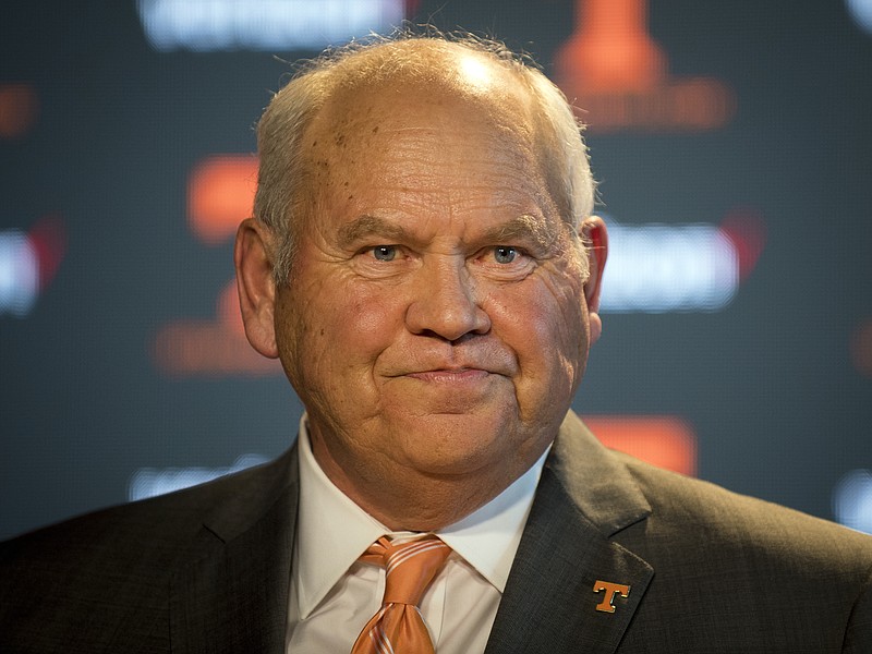 Phillip Fulmer smiles during a press conference, Friday, Dec. 1, 2017, in Knoxville, Tenn., where he was named athletic director at the University of Tennessee. The university placed former AD John Currie on paid leave amid what has been a tumultuous and embarrassing football coaching search. (Calvin Mattheis/Knoxville News Sentinel via AP)