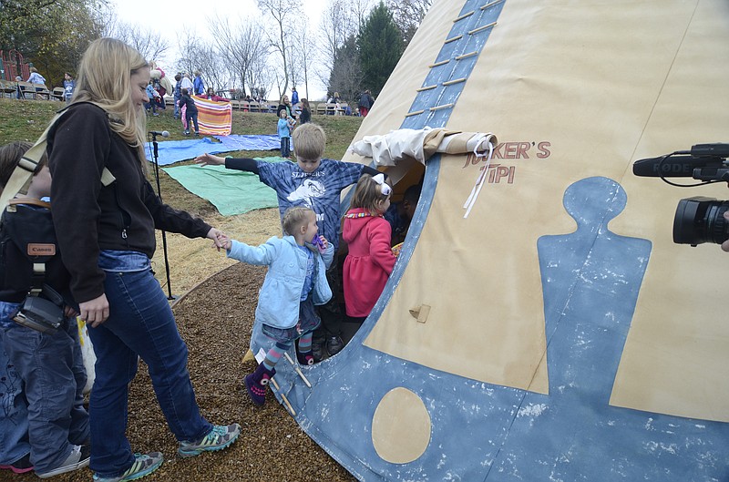 In this Nov 22, 2013, staff file photo, parents and students check out Tucker's Tipi at St. Peter's Episcopal School. The structure is named after former student Tucker Hunt.
