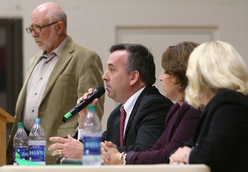 Jason Manuel, superintendent of Germantown Municipal Schools, answers a question during a panel at the Signal Mountain Town Hall gym Monday, Dec. 4, 2017 in Signal Mountain, Tenn. Two superintendents and a general counsel from two of the Memphis area municipal school districts were in attendance to share their perspectives regarding separating from the Shelby County School System and their insights on operating as municipal school districts since 2013. 