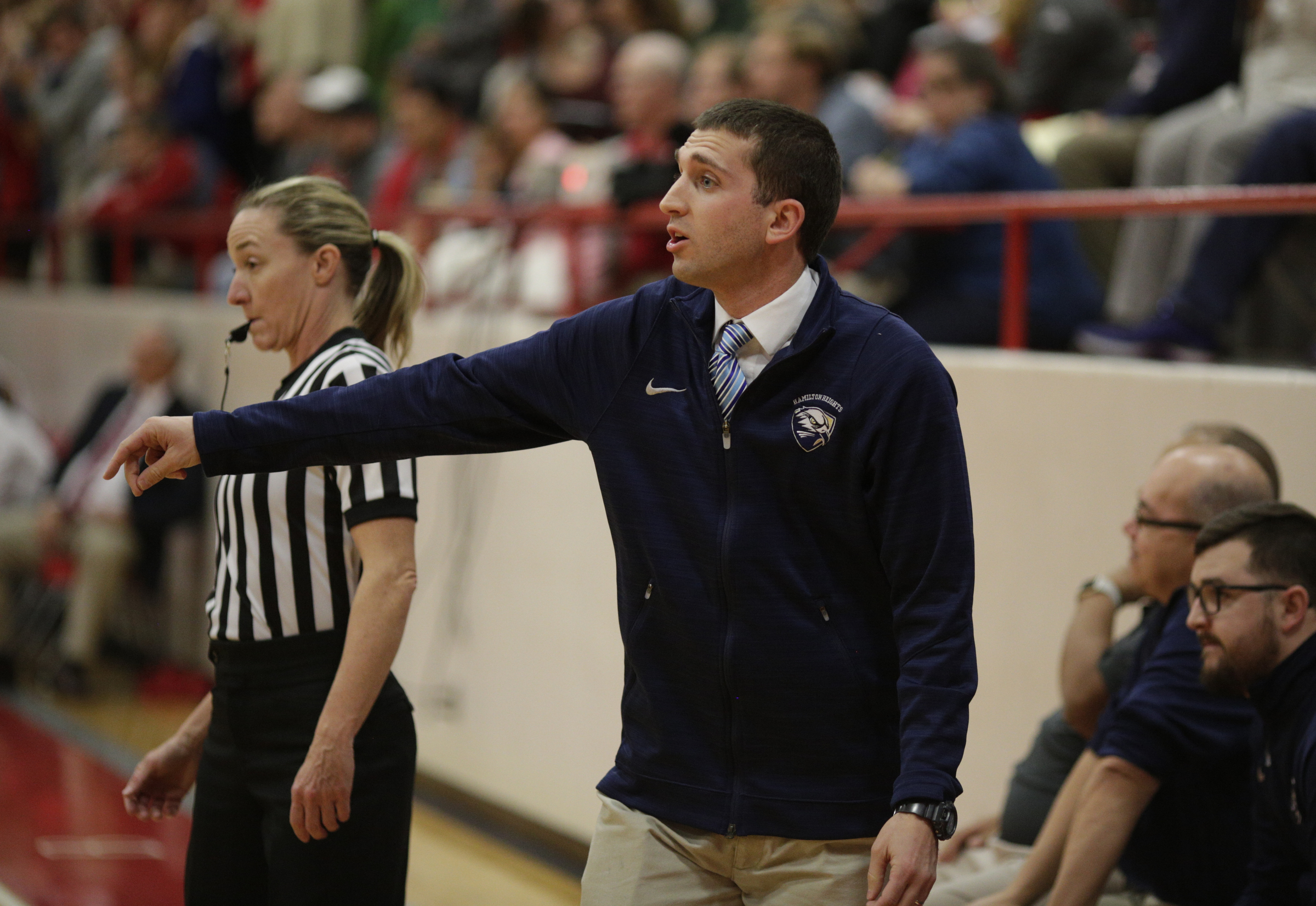 Hamilton Heights boys basketball coach Zach Ferrell directs players during their prep basketball game at Baylor School on Tuesday, Dec. 5, 2017, in Chattanooga, Tenn.