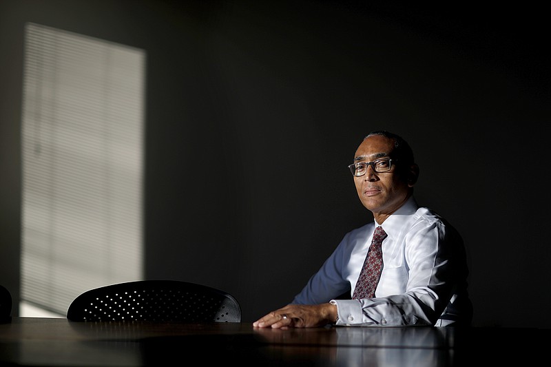 Burrell Ellis is photographed in the office of the American Civil Liberties Union of Georgia in Atlanta, Monday, Dec. 4, 2017. The former DeKalb County CEO whose convictions on corruption charges were tossed out by the state's highest court has been named political director for the ACLU of Georgia. The organization on Monday announced that Ellis would fill the newly created position, which is meant to expand the organization's advocacy infrastructure and help push its public policy objectives. (AP Photo/David Goldman)