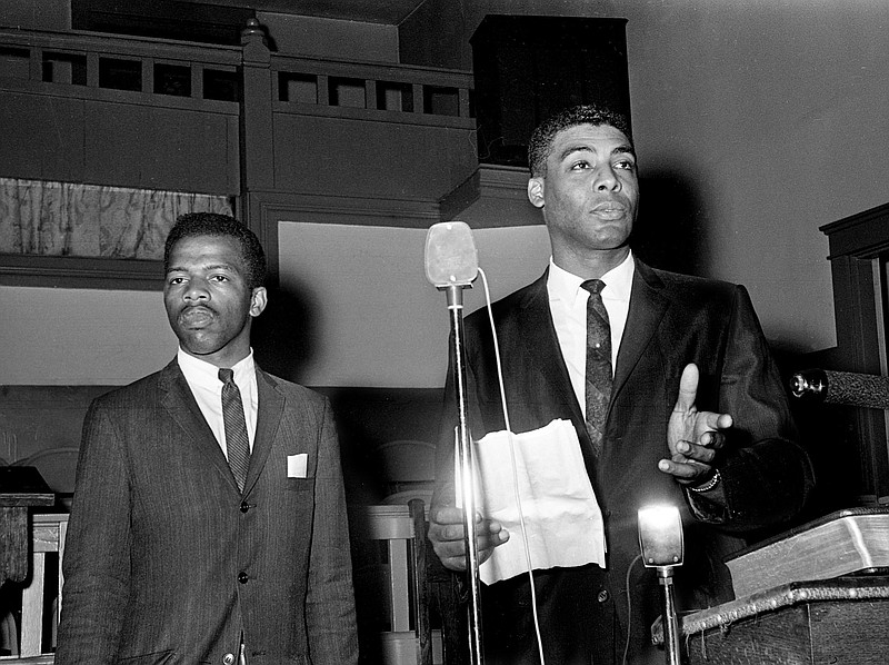 The Rev. Kelly Miller Smith, right, president of Nashville Christian Leadership Council and John Lewis, chairman of the Student Non-violence Committee of the NCLC, told a mass meeting of demonstrators May 10, 1963 at Mt. Zion Baptist Church on Jefferson St., not to protest in town until the outcome of the meeting between Nashville business officials and black leaders. (Photo: Jack Corn/The Tennessean)