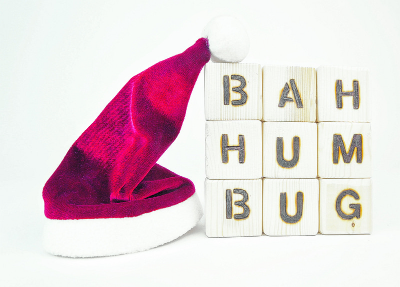 Bah Humbug spelled with toy blocksSanta hat.
