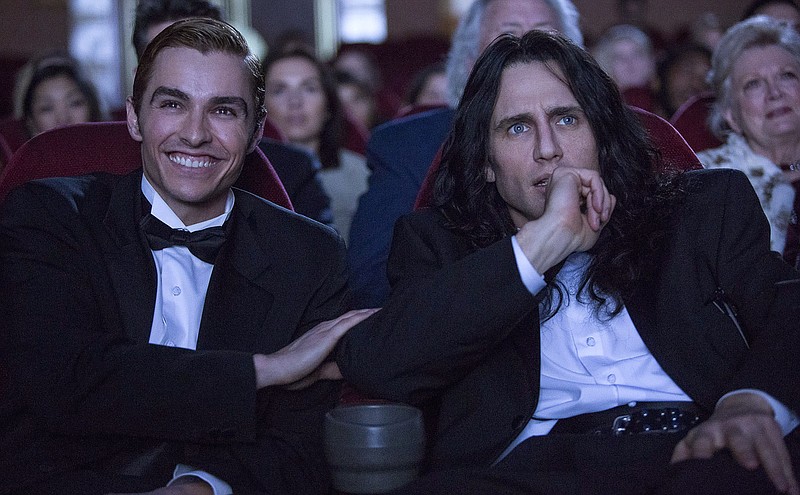 This image released by A24 shows Dave Franco, left, and James Franco in a scene from "The Disaster Artist." (Justina Mintz/A24 via AP)