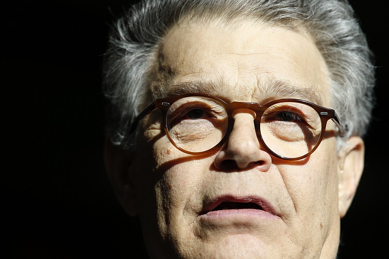 In this Nov. 27, 2017, photo, Sen. Al Franken, D-Minn., speaks to the media on Capitol Hill in Washington. Franken is denying an accusation by a former Democratic congressional aide that he tried to forcibly kiss her after a taping of his radio show in 2006. (AP Photo/Alex Brandon)