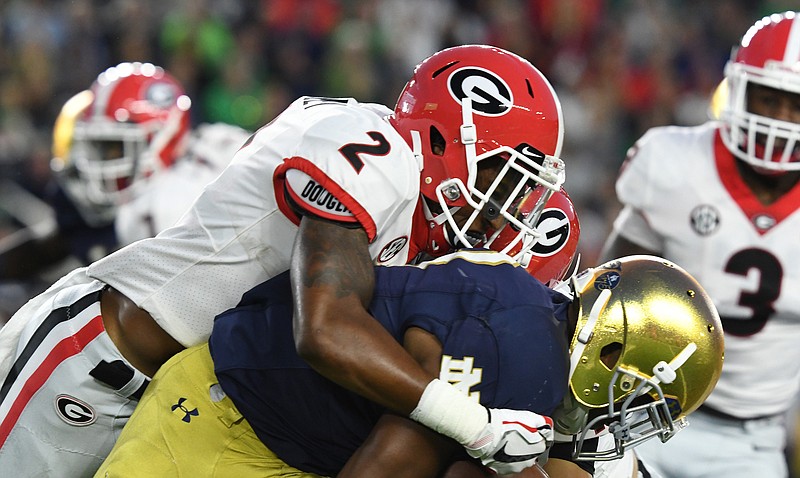 Freshman defensive back Richard LeCounte III makes a tackle during Georgia's 20-19 win at Notre Dame on Sept. 9.