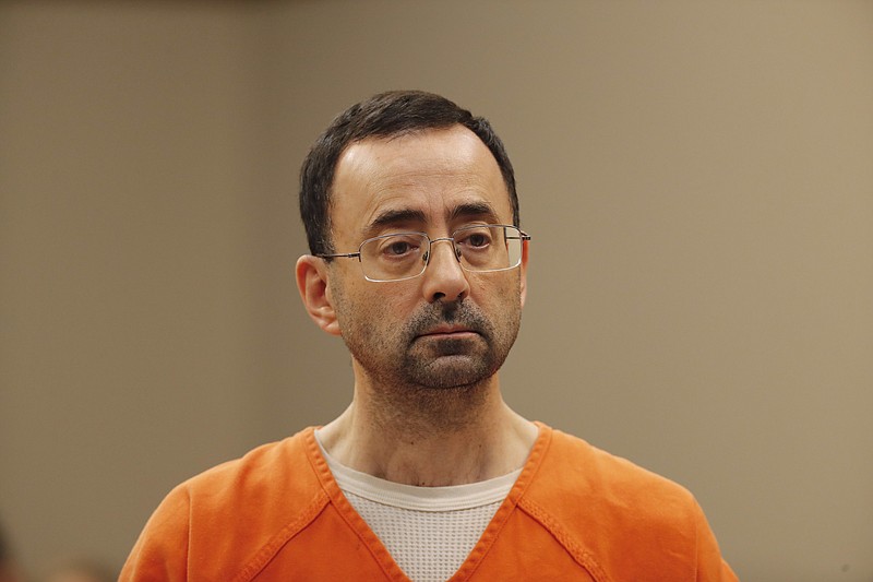 Dr. Larry Nassar, 54, appears in court for a plea hearing in Lansing, Mich., Wednesday, Nov. 22, 2017. 