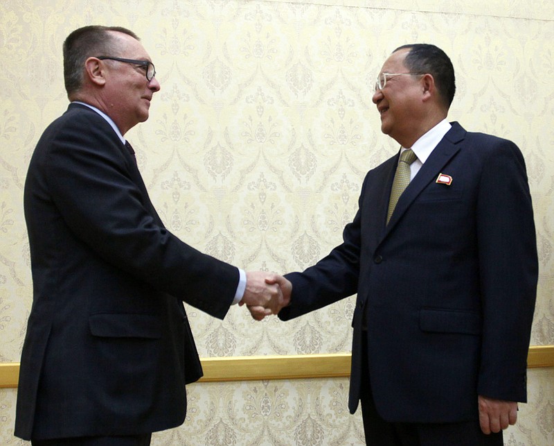 North Korean Foreign Minister Ri Yong Ho, right, and U.N. undersecretary-general for political affairs Jeffrey Feltman shake hands at the Mansudae Assembly Hall in Pyongyang, North Korea Thursday, Dec. 7, 2017. The senior United Nations official is on a four-day visit to the country at the invitation of the North Korean government. (AP Photo/Jon Chol Jin)
