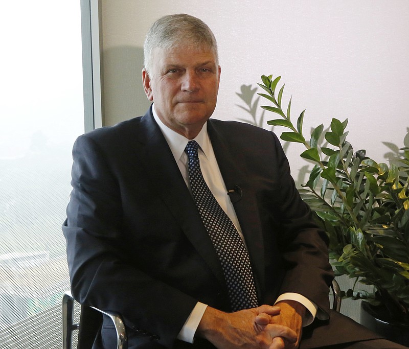 In this Thursday, Dec. 7, 2017, photo, President and CEO of Billy Graham Evangelistic Association Franklin Graham poses for photos during an interview with the Associated Press, in Hanoi, Vietnam. 
