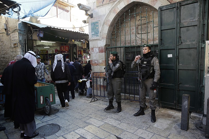 Israeli border policemen stand in Jerusalem's Old City in Jerusalem, Friday, Dec. 8, 2017. Israeli police deployed reinforcements in and around Jerusalem's Old City on Friday, in anticipation of Palestinian protests over the Trump administration's recognition of the contested city as the Israeli capital. (AP Photo/Mahmoud Illean)