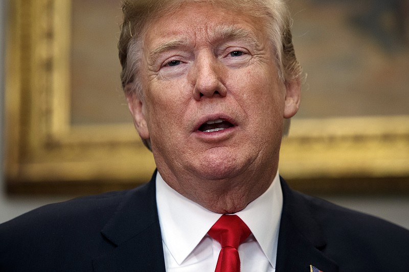 
              President Donald Trump speaks during a swearing in ceremony for the new Secretary of Homeland Security Kirstjen Nielsen, in the Roosevelt Room of the White House, Friday, Dec. 8, 2017, in Washington. (AP Photo/Evan Vucci)
            