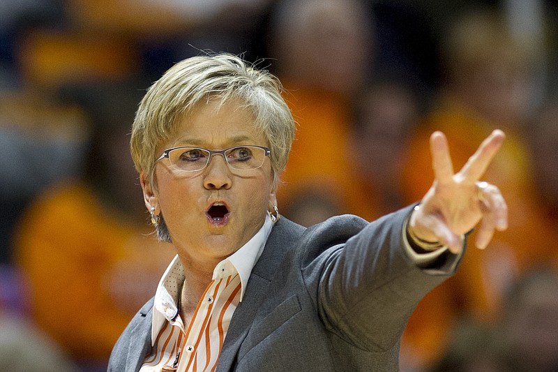 Tennessee head coach Holly Warlick calls to her team in the first half of an NCAA college basketball game against Texas, Sunday, Dec. 10, 2017, in Knoxville, Tenn. (AP Photo/Calvin Mattheis)