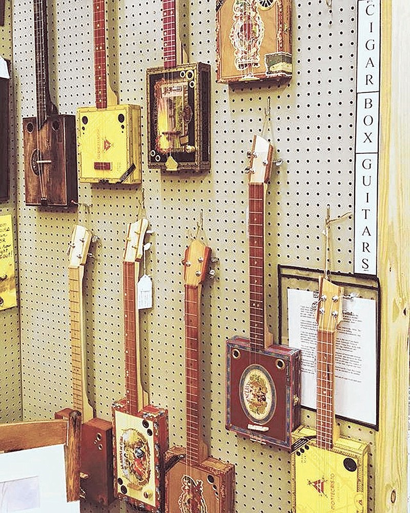 Debbie Thompson's cigar box guitars can be found at Vinterest Antiques, at 2105 Northpoint Blvd. in Hixson, during the holiday season. (contributed photo)