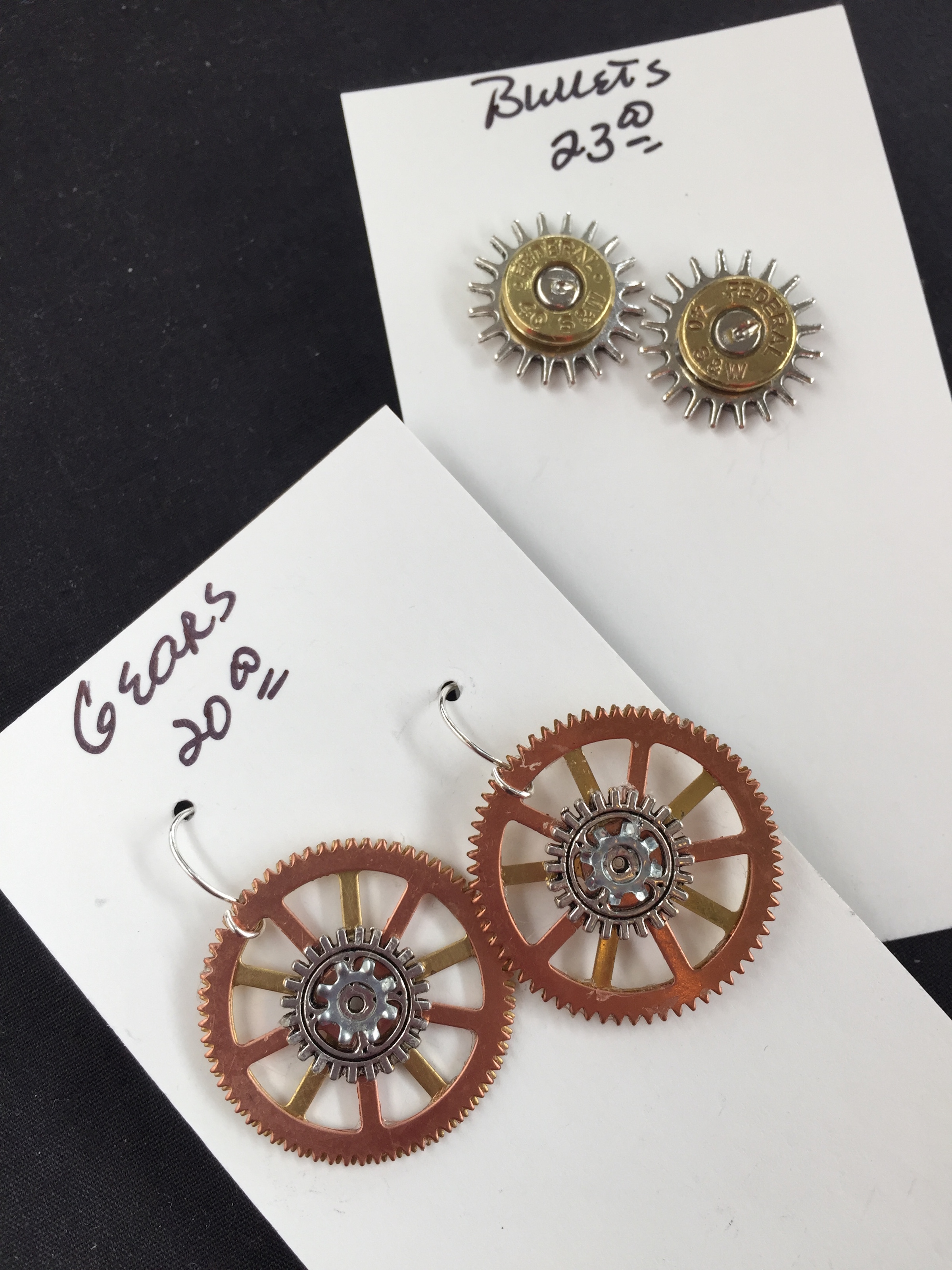 Cindy Hawthorne of Cindy's 
Imagination turns watch gears into dangle earrings and 
bullets into studs. Copper gear earrings $20; bullet 
studs $23.