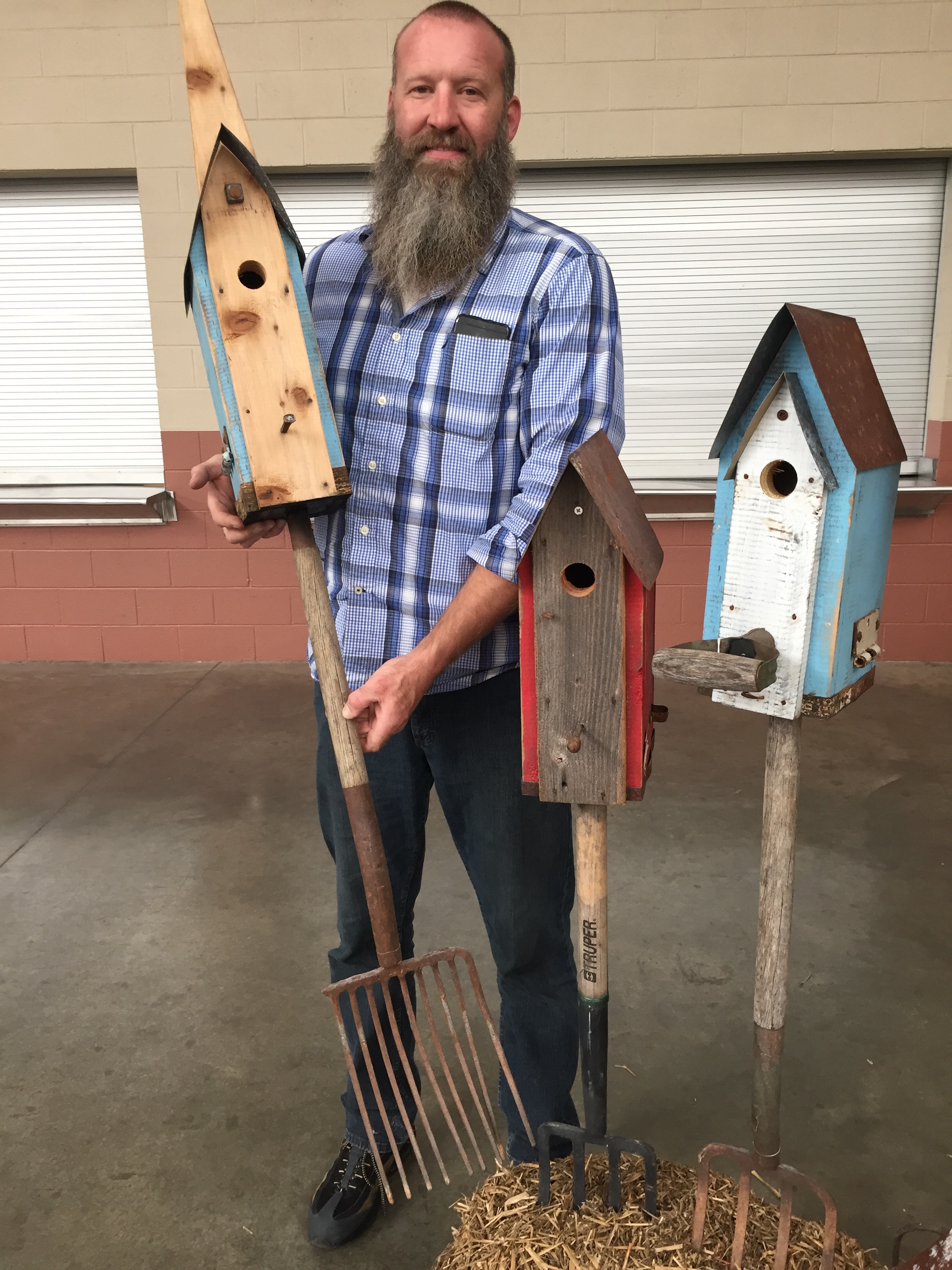 Bill Southerland of Country Creek Relics in Soddy-Daisy scavenges flea markets and The World's Longest Yard Sale in search of old pitchforks and hay forks that he transforms into bases for tin-roof birdhouses. The tines on the upcycled tools hold the birdhouses stationary in the ground as well as making decorative yard/garden art. Priced $70-$75.
