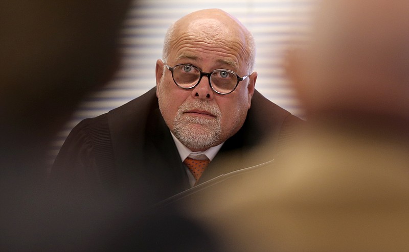 Judge Mike Pemberton is seen during a hearing in the courtroom at the Cleveland Municipal Building on Wednesday, Dec. 13, 2017 in Cleveland, Tenn. Pemberton was hearing evidence on a lawsuit filed by David Fowler, on behalf of Bradley County Commissioner Howard Thompson and Kinser Church of God Pastor Guinn Green, to prevent Bradley County from issuing marriage licenses in response to the U.S. Supreme Court ruling allowing same-sex marriage. 