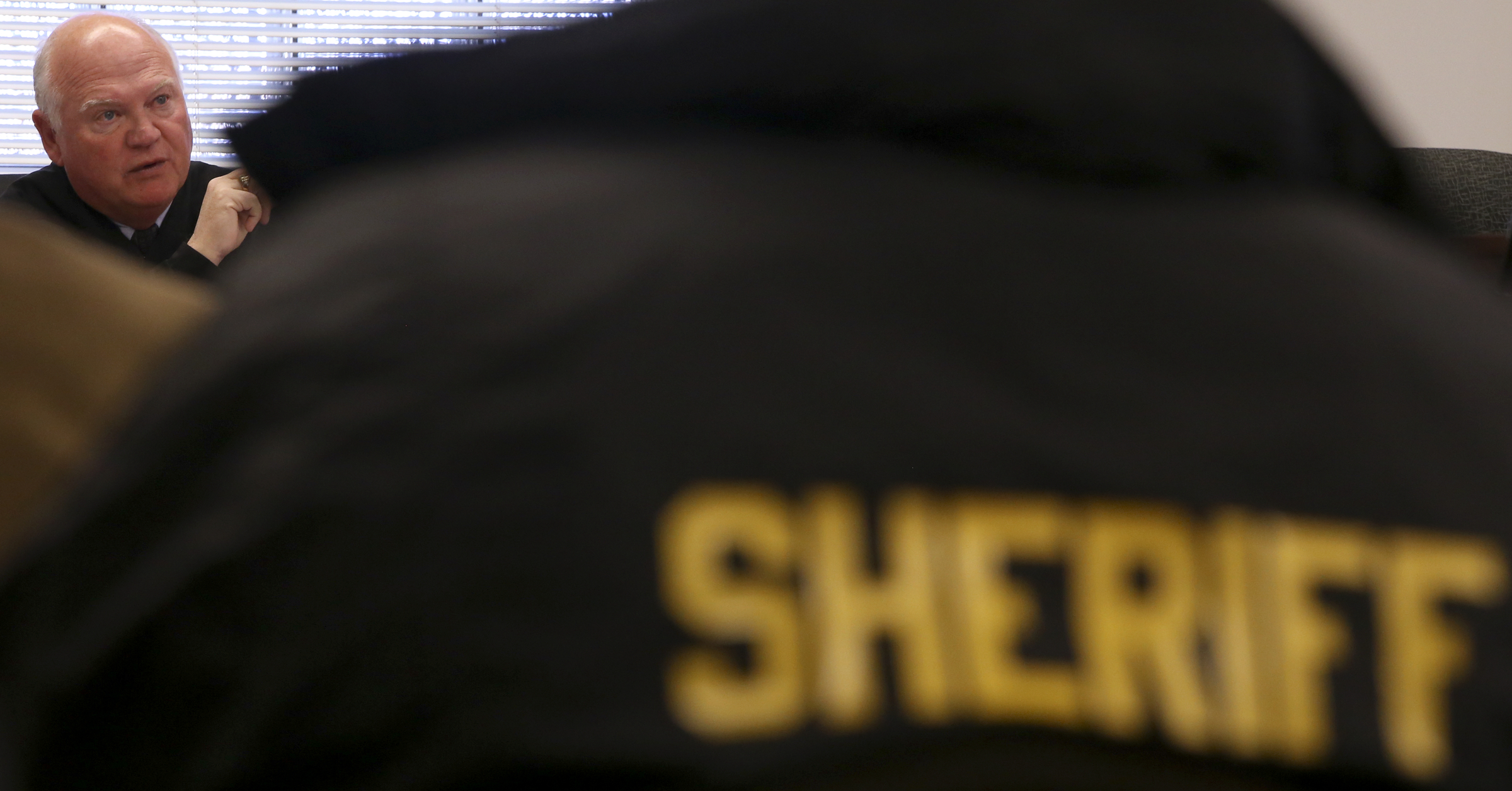 Judge Don Ash speaks during a hearing on a motion to dismiss felony counts against Bradley County Sheriff Eric Watson in the courtroom at the Cleveland Municipal Building on Wednesday, Dec. 13, 2017 in Cleveland, Tenn. Sheriff Watson is being charged with 12 felonies in relation to forged vehicle registrations.