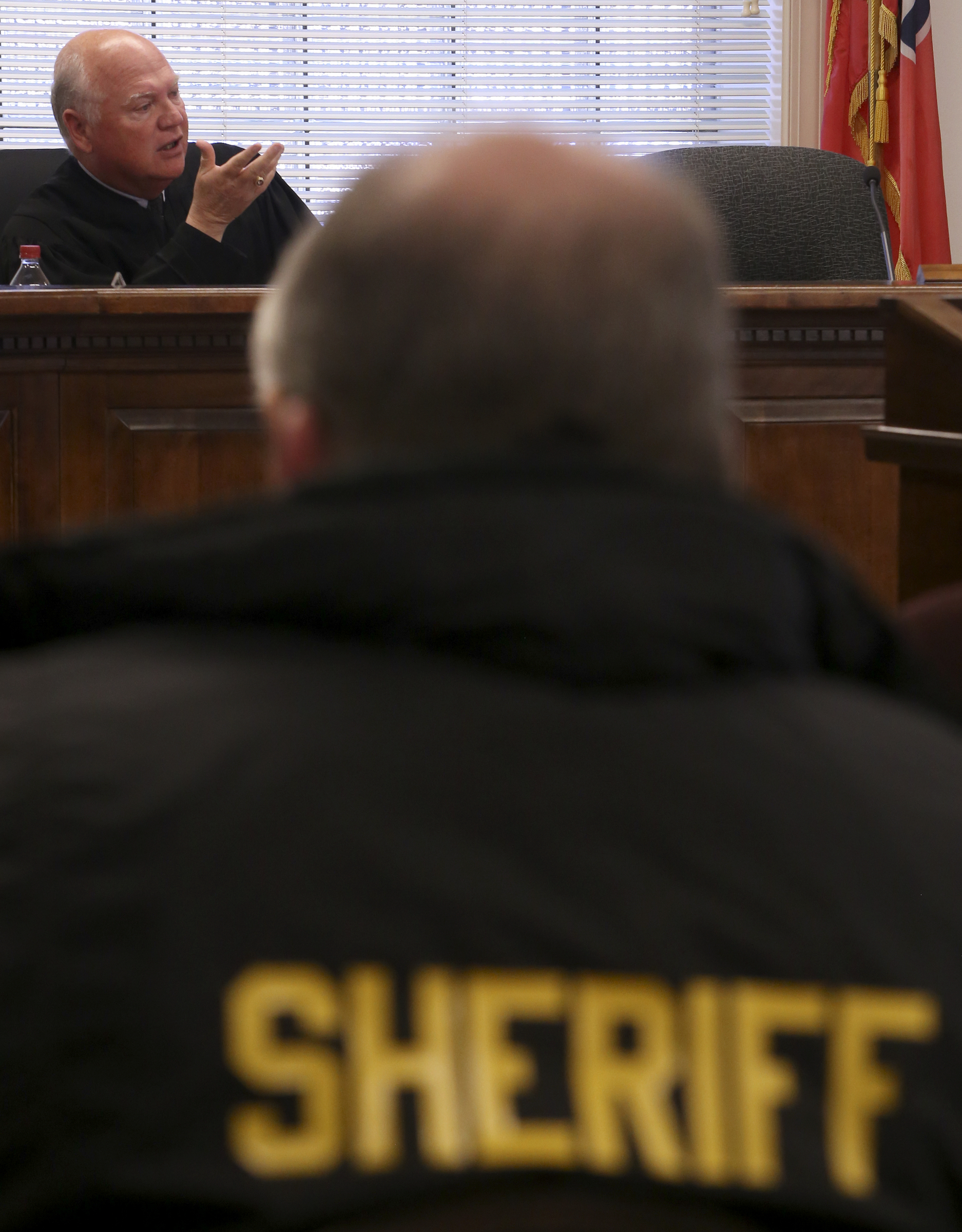 Judge Don Ash speaks during a hearing on a motion to dismiss felony counts against Bradley County Sheriff Eric Watson in the courtroom at the Cleveland Municipal Building on Wednesday, Dec. 13, 2017 in Cleveland, Tenn. Sheriff Watson is being charged with 12 felonies in relation to forged vehicle registrations.