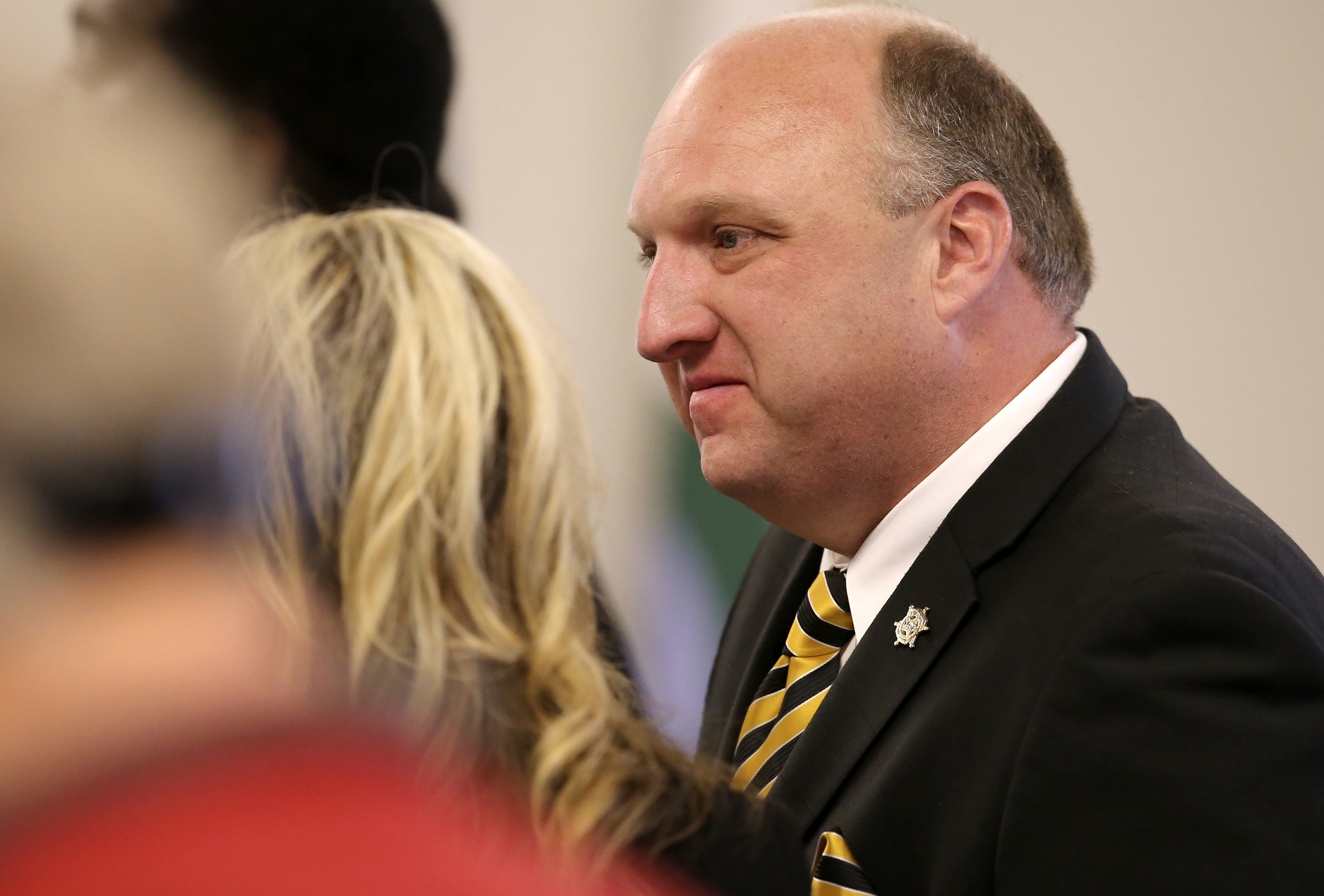 Bradley County Sheriff Eric Watson prepares to leave the courtroom after a motions hearing at the Cleveland Municipal Building on Wednesday, Dec. 13, 2017 in Cleveland, Tenn. Sheriff Watson is being charged with 12 felonies in relation to forged vehicle registrations.