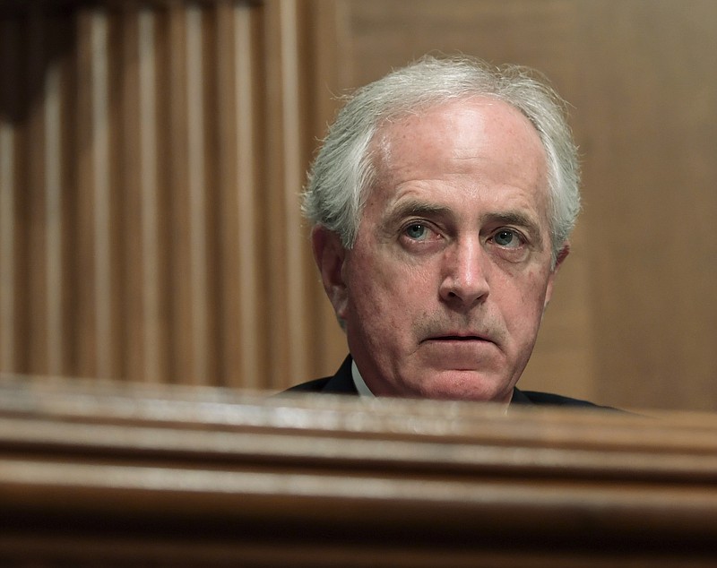 Sen. Bob Corker, R-Tenn., listens during a meeting of the Senate Banking Committee on Capitol Hill in Washington, Tuesday, Dec. 5, 2017, as the committee members prepare to vote on Jerome Powell to be Federal Reserve System Chairman of the Board of Governors. (AP Photo/Susan Walsh)