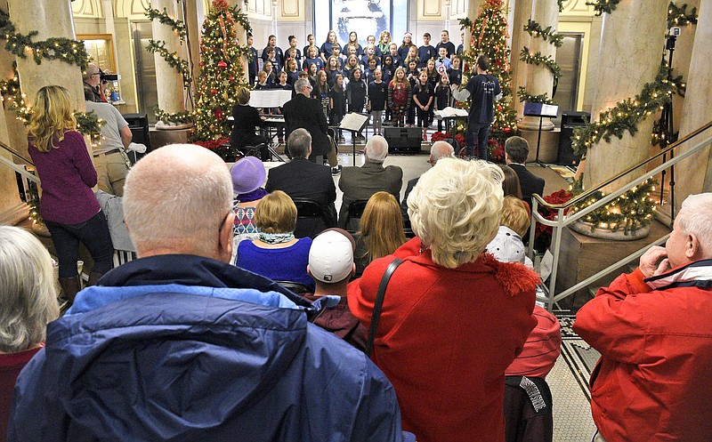 People listen to the Middle Valley Elementary Voices.  The 33rd annual Christmas the Courthouse series continued with the Middle Valley Elementary Voices and the Hunter Middle School Choir performing in honor of Hamilton County Criminal Court Judges Barry Stealman, Tom Greenholtz, Tom Poole and Criminal Court Clerk Vince Dean on December 13, 2017.  Performances will be held today at 11:30, and will conclude on Friday with the music beginning at 11.  