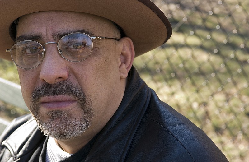 In this Feb. 3, 2007, file photo, Pat DiNizio of Smithereens poses for a photograph in New York. DiNizio, lead singer and songwriter of the New Jersey rock band died at age 62. The band announced on Facebook that DiNizio died Tuesday, Dec. 12, 2017. (AP Photo/Jim Cooper, FIle)