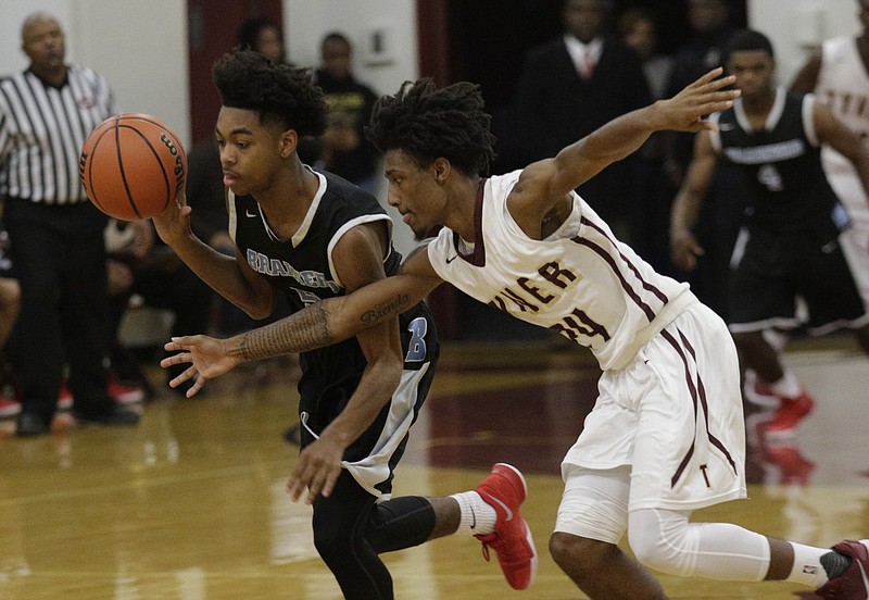 Brainerd's Malik Hymon, left, steals the ball from Tyner's Jeremy Elston during their prep basketball game at Tyner Academy on Friday, Dec. 15, 2017, in Chattanooga, Tenn.