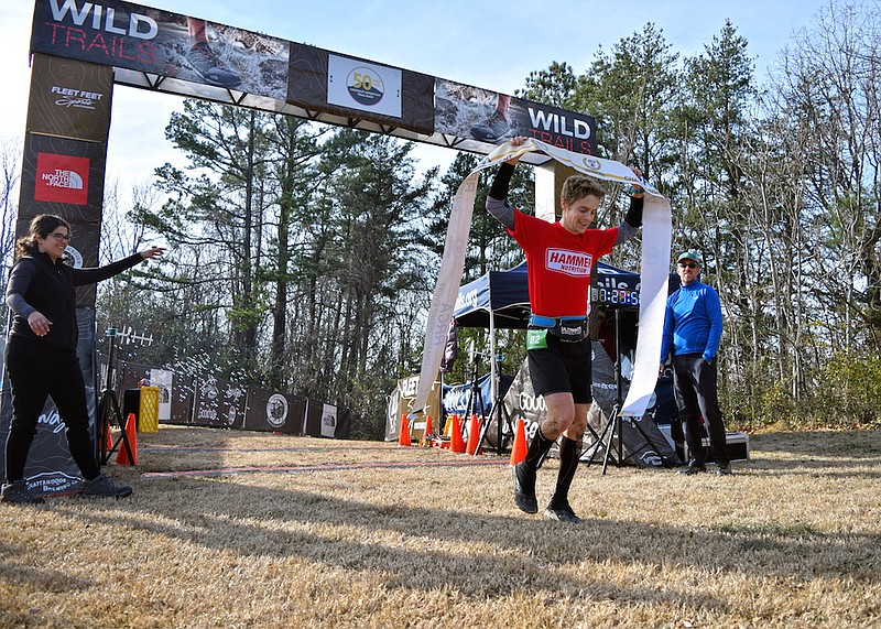 John Kelly, 33, of Rockville, Md., crosses the finish line as the winner of the Lookout Mountain 50 Miler trail race Saturday. The race was this year's Road Runners Club of America 2017 National Ultra Championship.