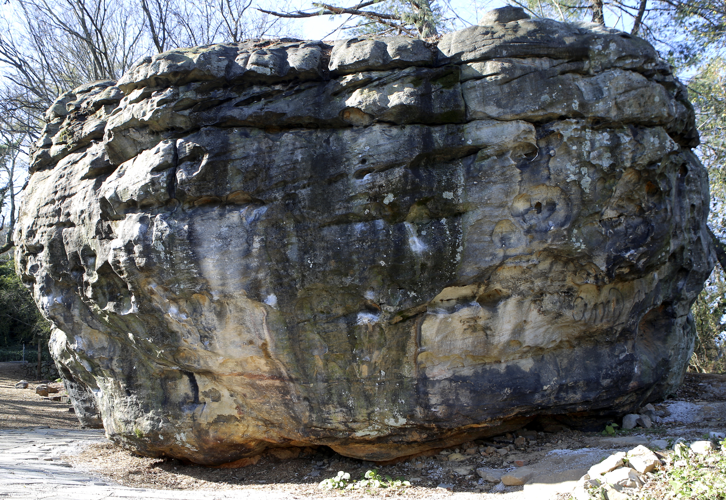 The Cliff Hanger boulder is seen on Thursday, Dec. 14, 2017 in Chattanooga, Tenn. The Lookout Mountain Conservancy plans to create a conservation-themed neighborhood of 24 homes on 3.5 acres at the site of the old Scholze home place.