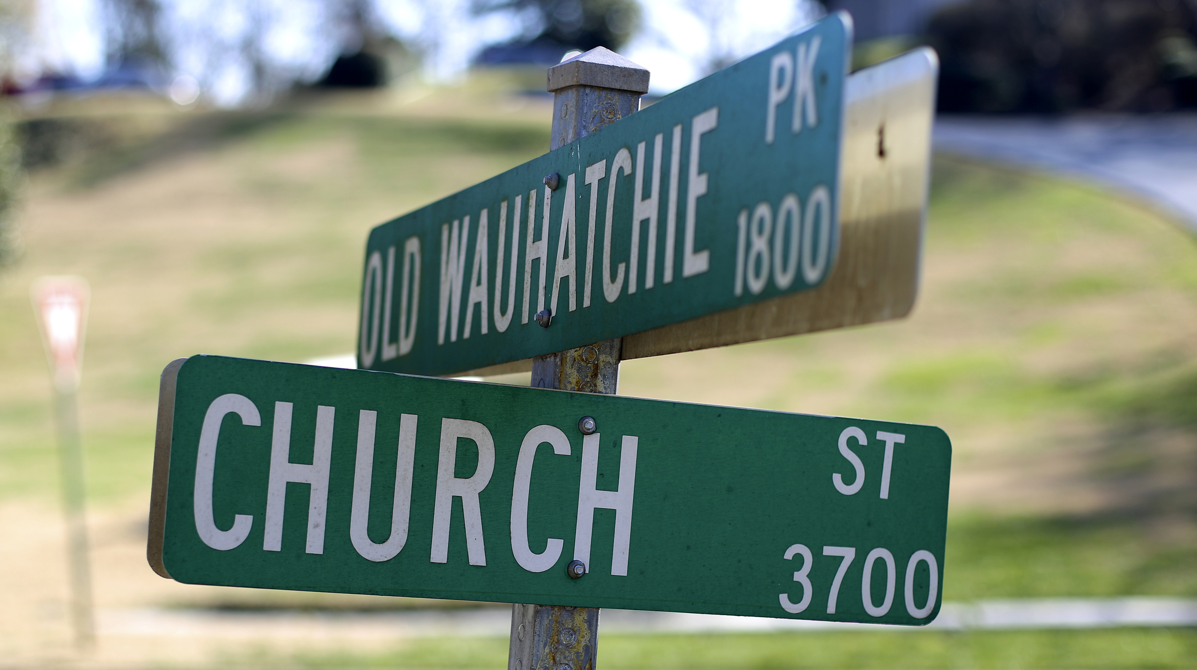 The street sign for Old Wauhatchie Pike and Church Street is seen on Thursday, Dec. 14, 2017 in Chattanooga, Tenn. The Lookout Mountain Conservancy plans to create a conservation-themed neighborhood of 24 homes on 3.5 acres at the site of the old Scholze home place.