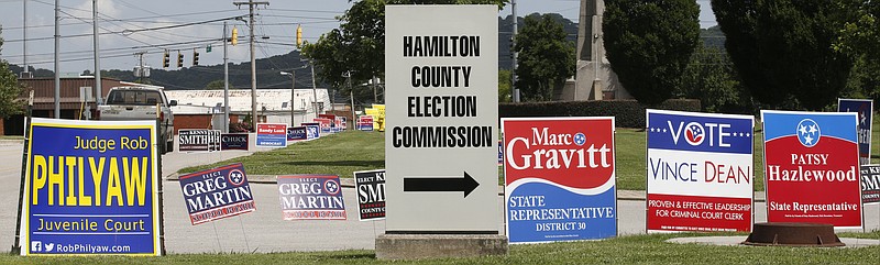 Campaign signs dot the green spaces outside the Hamilton County Election Commission off Amnicola Highway in 2014.