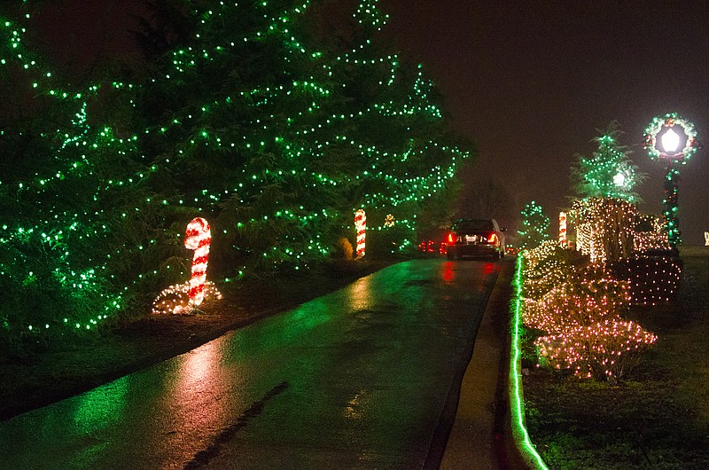 As soon as drivers turn off Belvoir Avenue onto Fountain Avenue, they will see the glow of the green lights draping trees all over "Helton Hill" in East Ridge. For more than 20 years, the Shrader/Helton families have decorated the East Ridge hill on which a large part of their family lives. Visitors turn off Fountain into the driveway and follow it around a loop at the top of the hill. Donations of canned food are requested for the Chattanooga Community Kitchen.